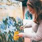 Joana Mollet Artist working on Agapanthus painting
